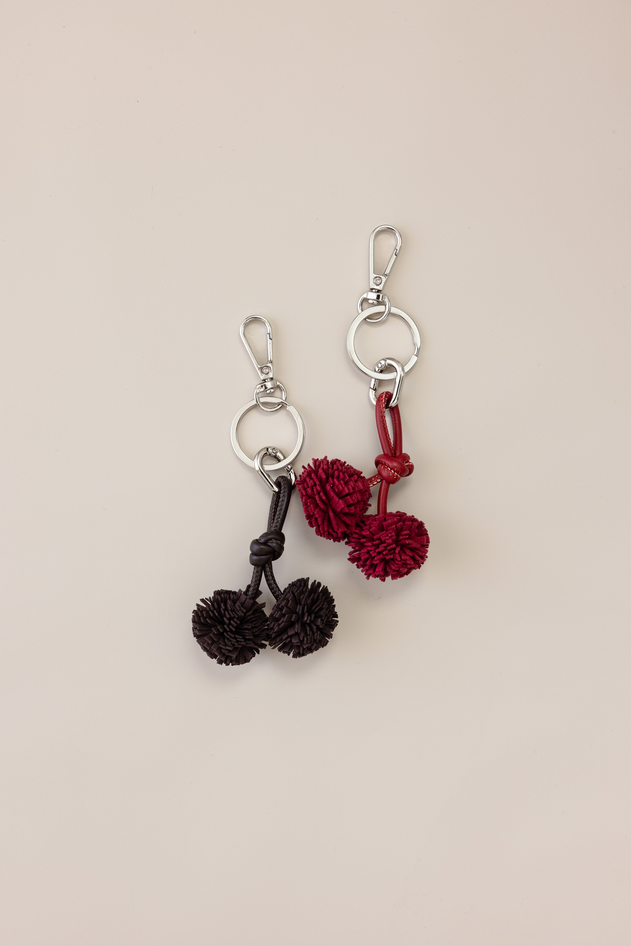 Signature Leather Bow & Pom Pom Charm