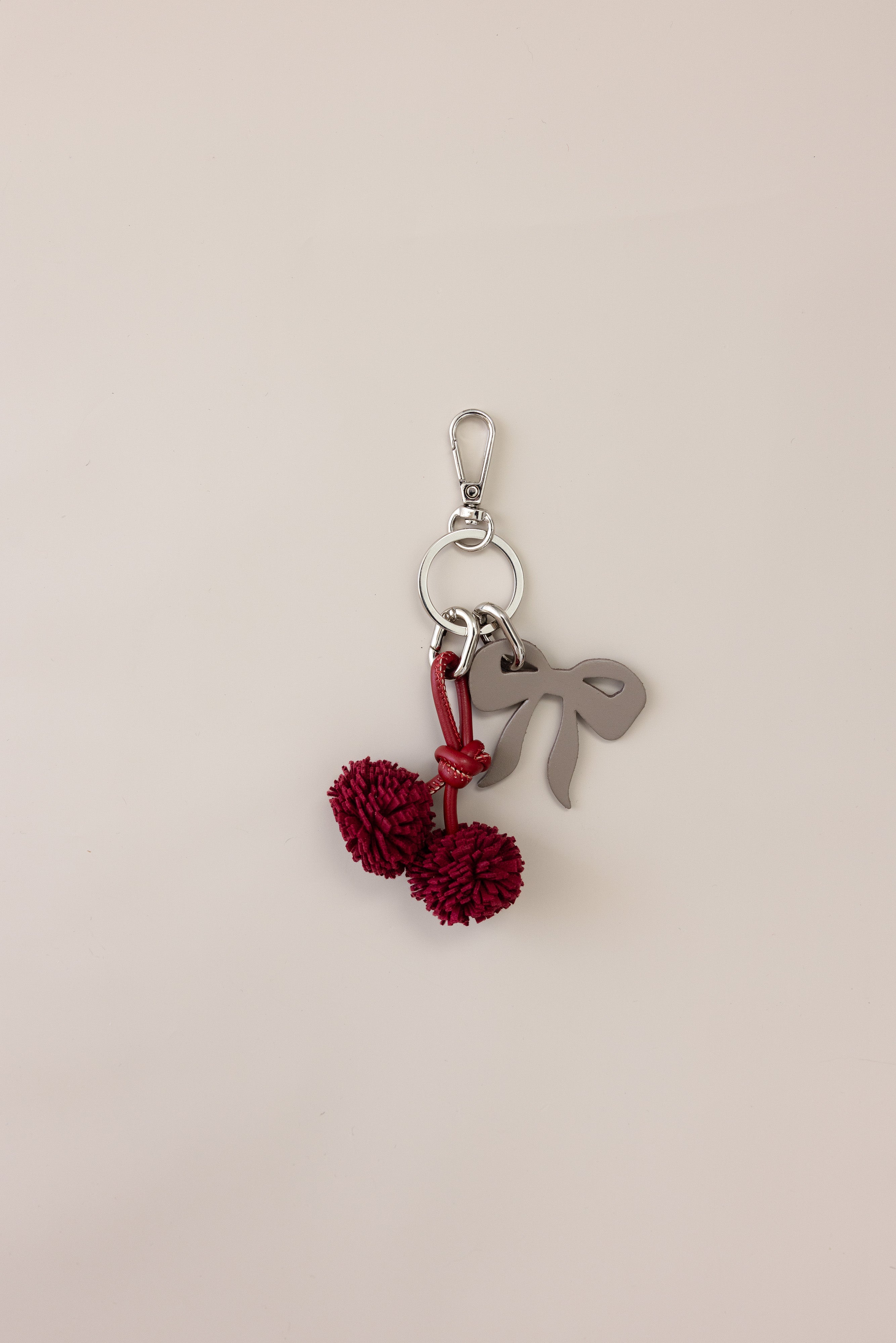 Signature Leather Bow & Pom Pom Charm