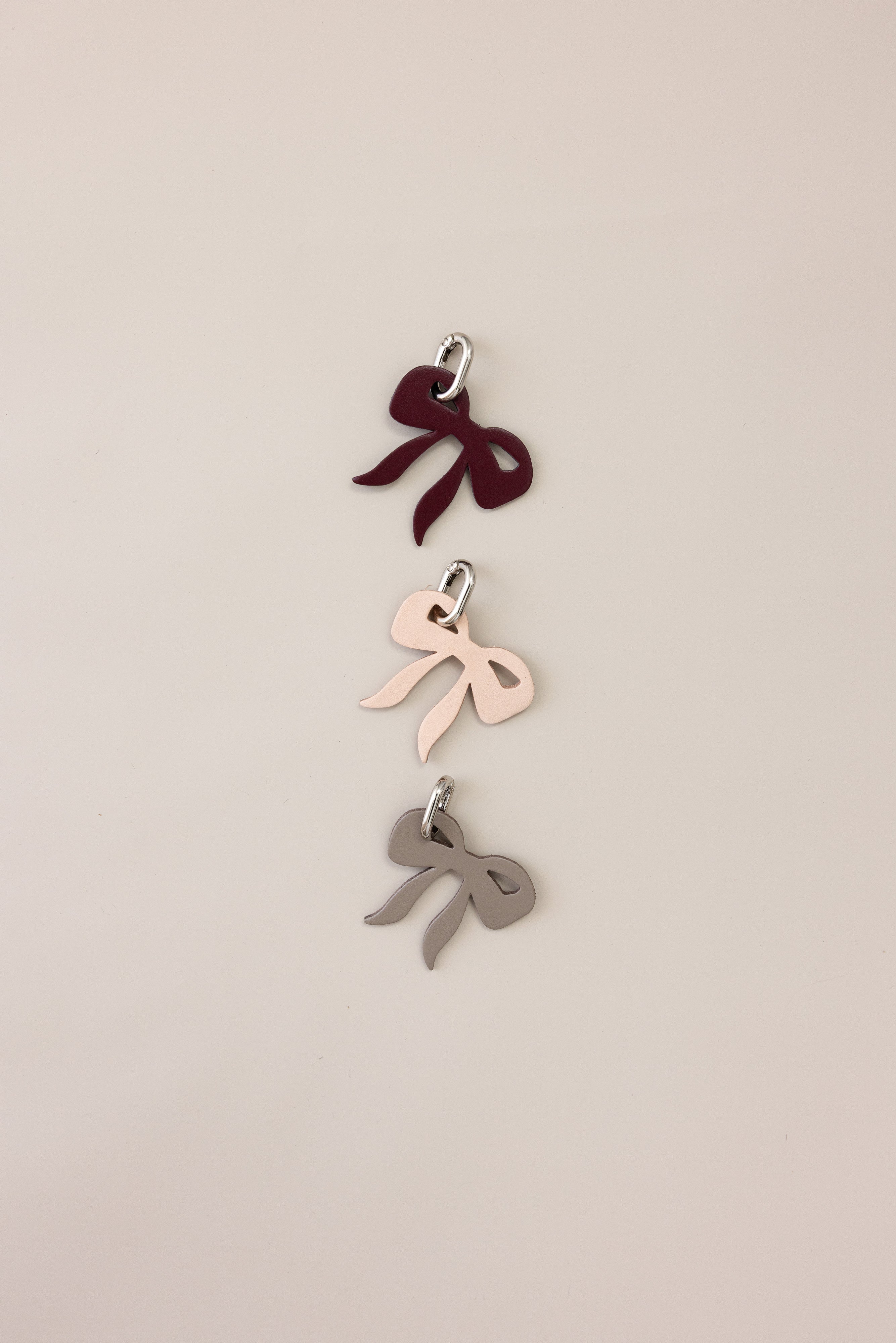 Signature Leather Bow & Pom Pom Charm